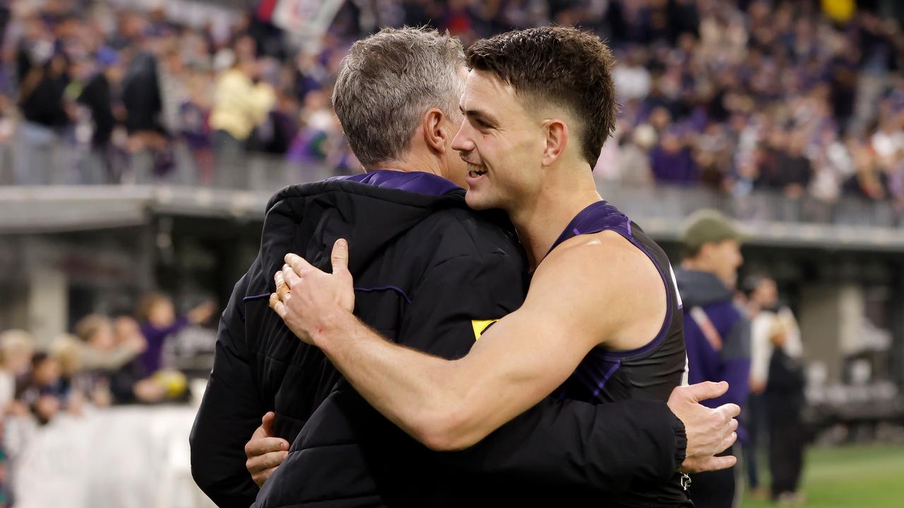 Justin Longmuir shows his appreciation for power forward Patrick Voss.