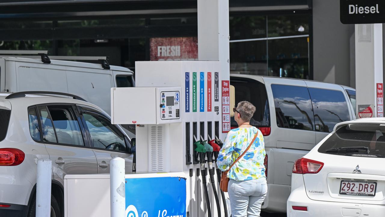 People filling their cars with petrol (file image)
