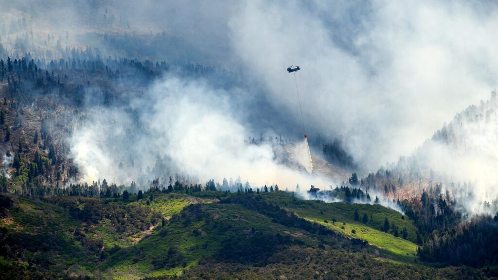 The largest blaze in the US is burning in rugged terrain in southwest Utah.
