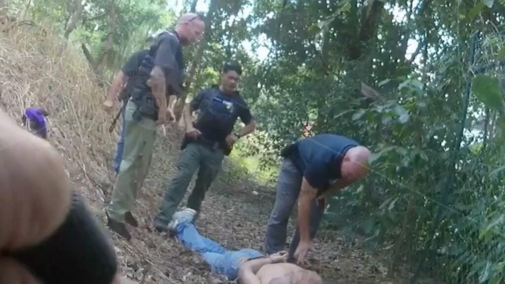 A fugitive bikie is back in custody following a dramatic escape from a courtroom.
