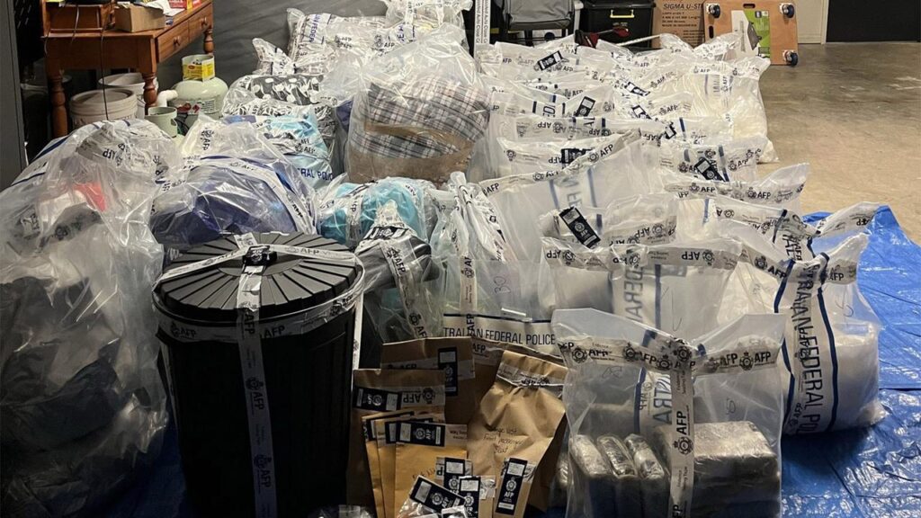 Six men are accused of helping move and stash drugs through a chain of suburban safe houses.
