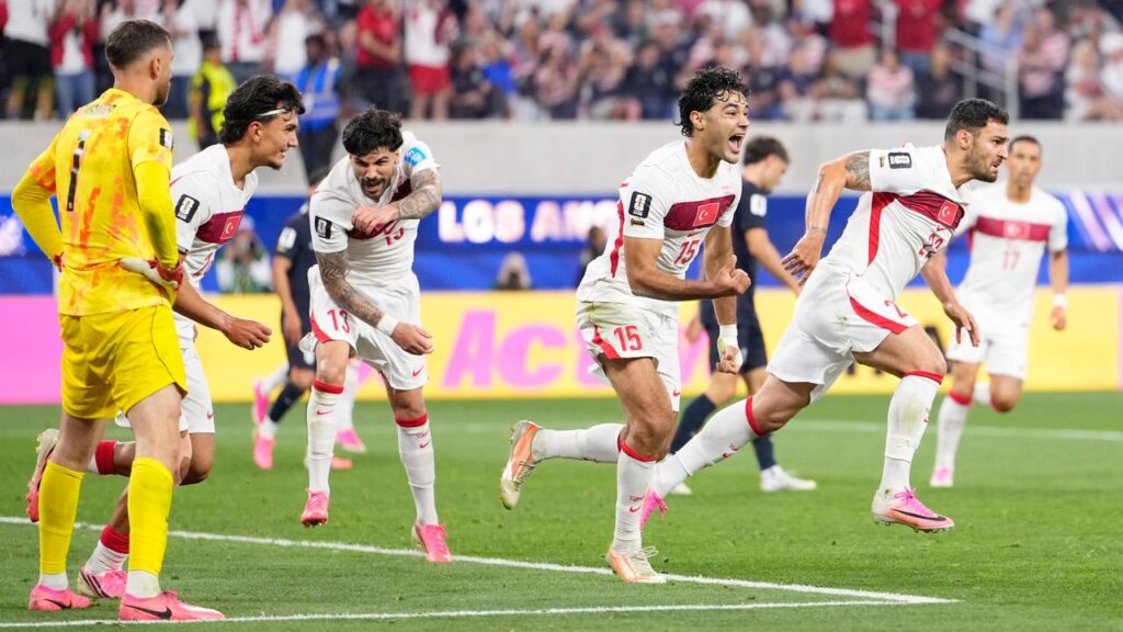 Turkey’s Kaan Ayhan (centre) netted a dramatic late winner to sink the US in California.
