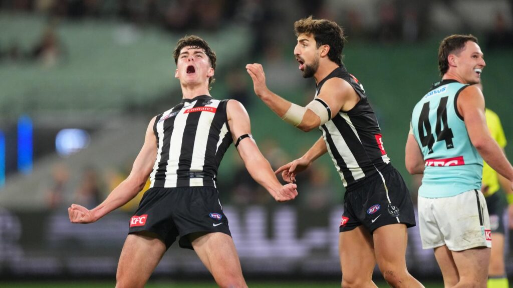 Sam Swadling celebrates after kicking a goal for the Magpies in their win over the Power.
