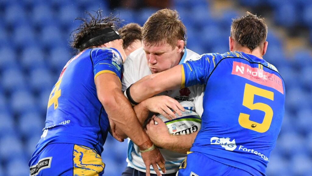 Tom Staniforth is tackled while playing for the Waratahs. He has been in France since 2021.
