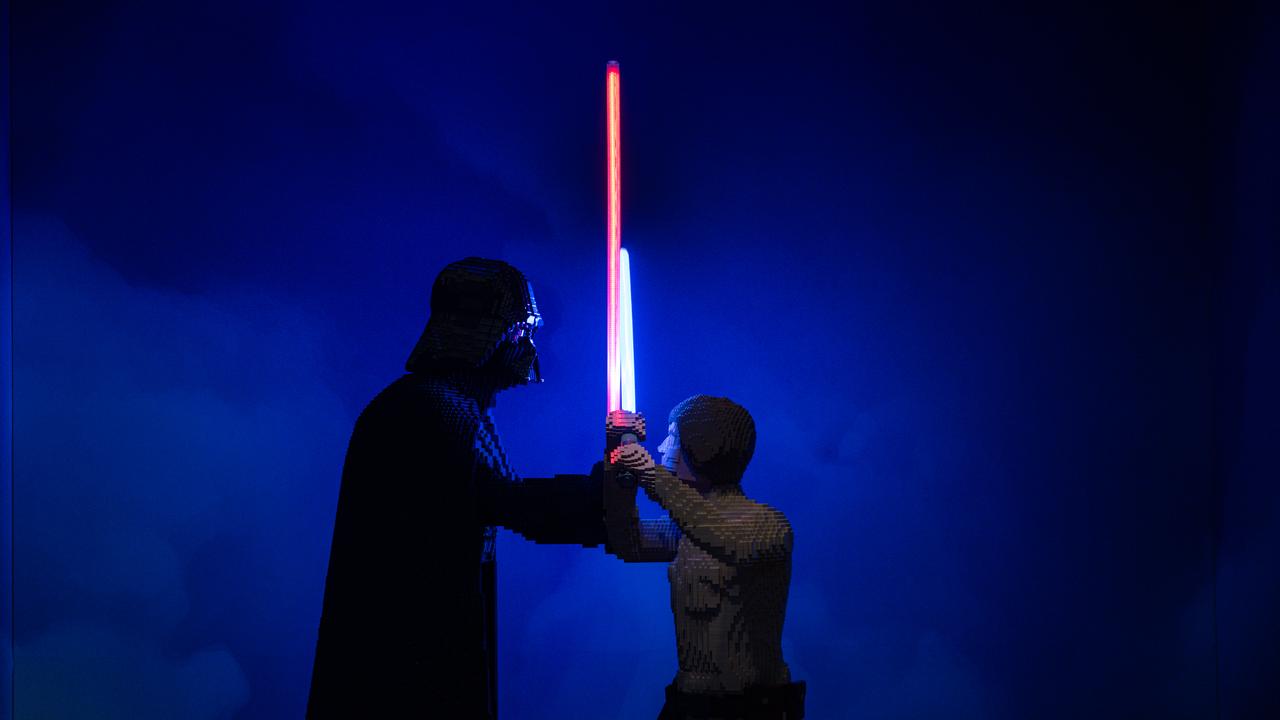 A lightsaber battle in LEGO