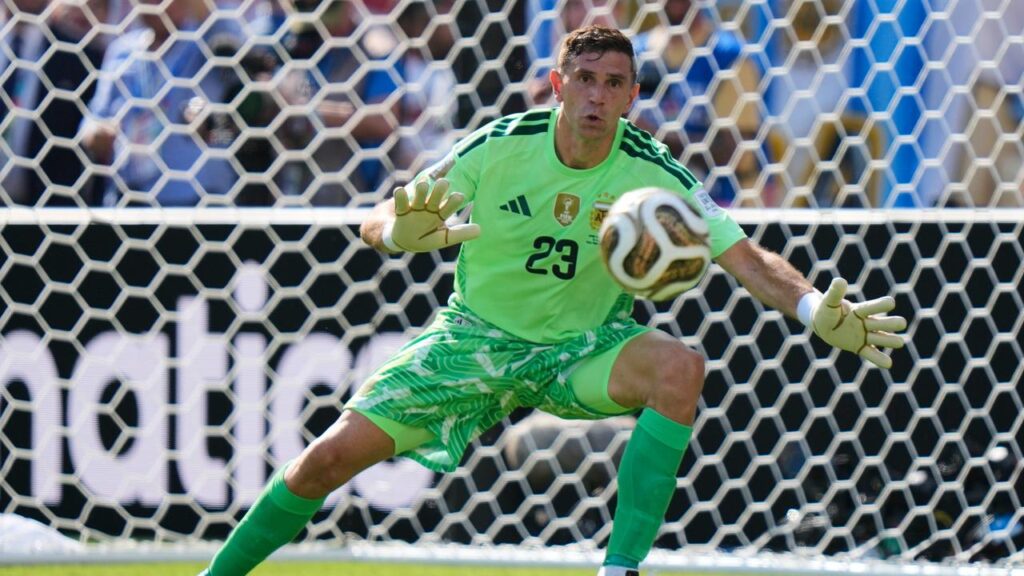 Emiliano Martinez kept Argentina alive as the World Cup final aganst Spain went to extra time. 
