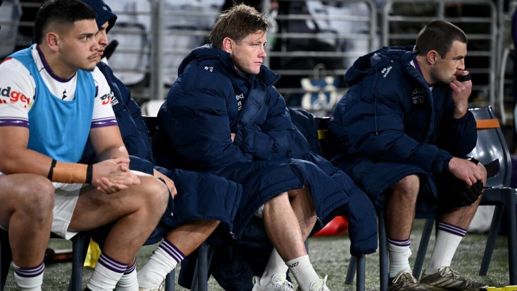 Injured skipper Harry Grant (centre) is offering his Storm team plenty from the sidelines.
