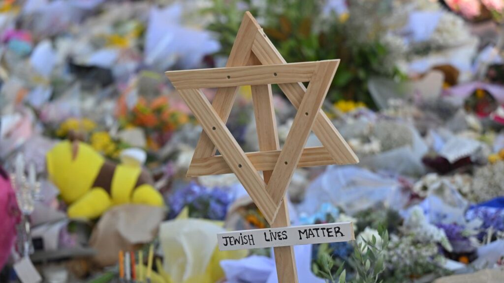 The commission where Minus’s protest took place was called after a Jewish festival was attacked.
