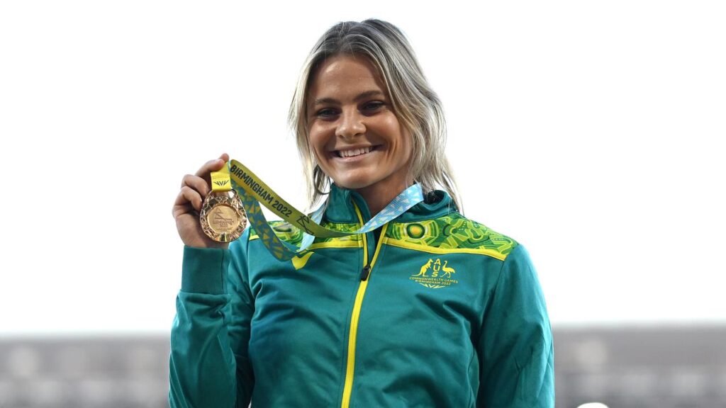 Australian flag bearer Nina Kennedy is seeking to win back-to-back Commonwealth Games gold medals.
