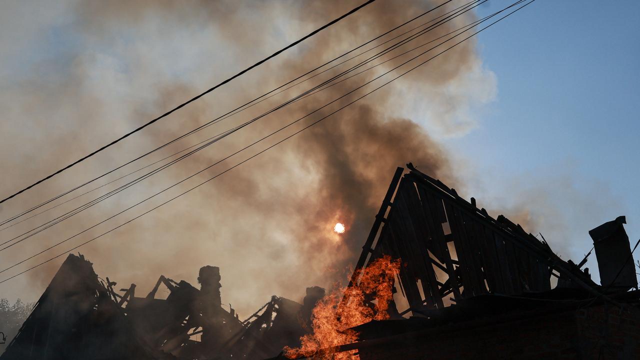 A residential house burns after a Russian strike in Zaporizhzhia