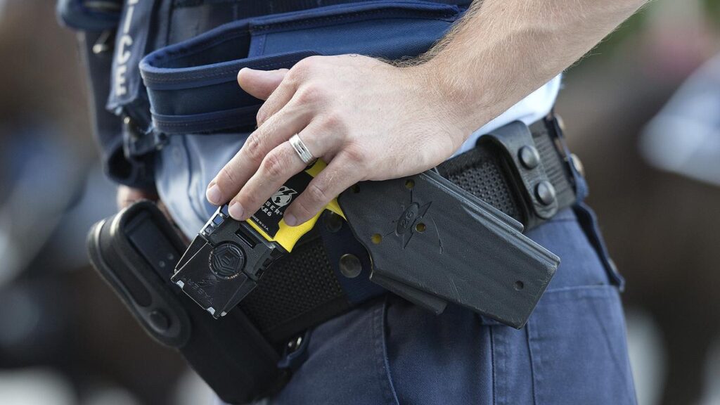 A police officer is in a stable condition after being shot in the leg at a Queensland property.
