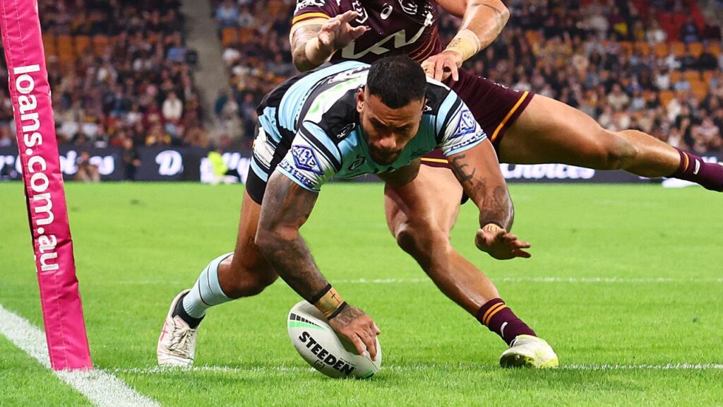 Sione Katoa scored a first-half double and once after the break to help the Sharks sink Brisbane.
