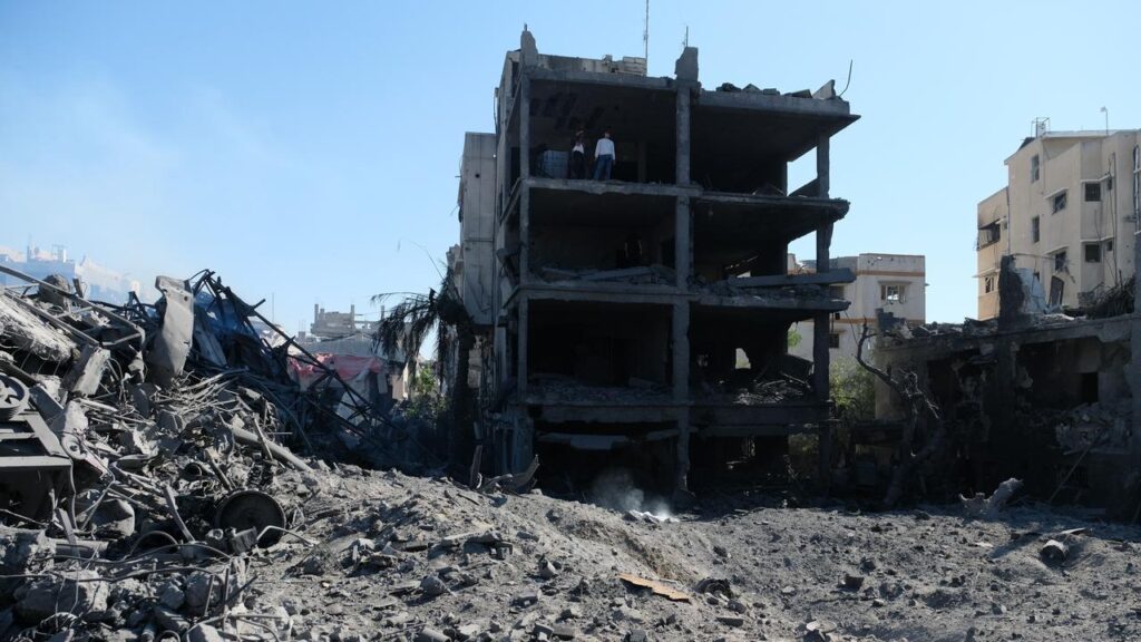 Three Israeli missiles struck a metal foundry in Gaza City, killing four people, witnesses say.

