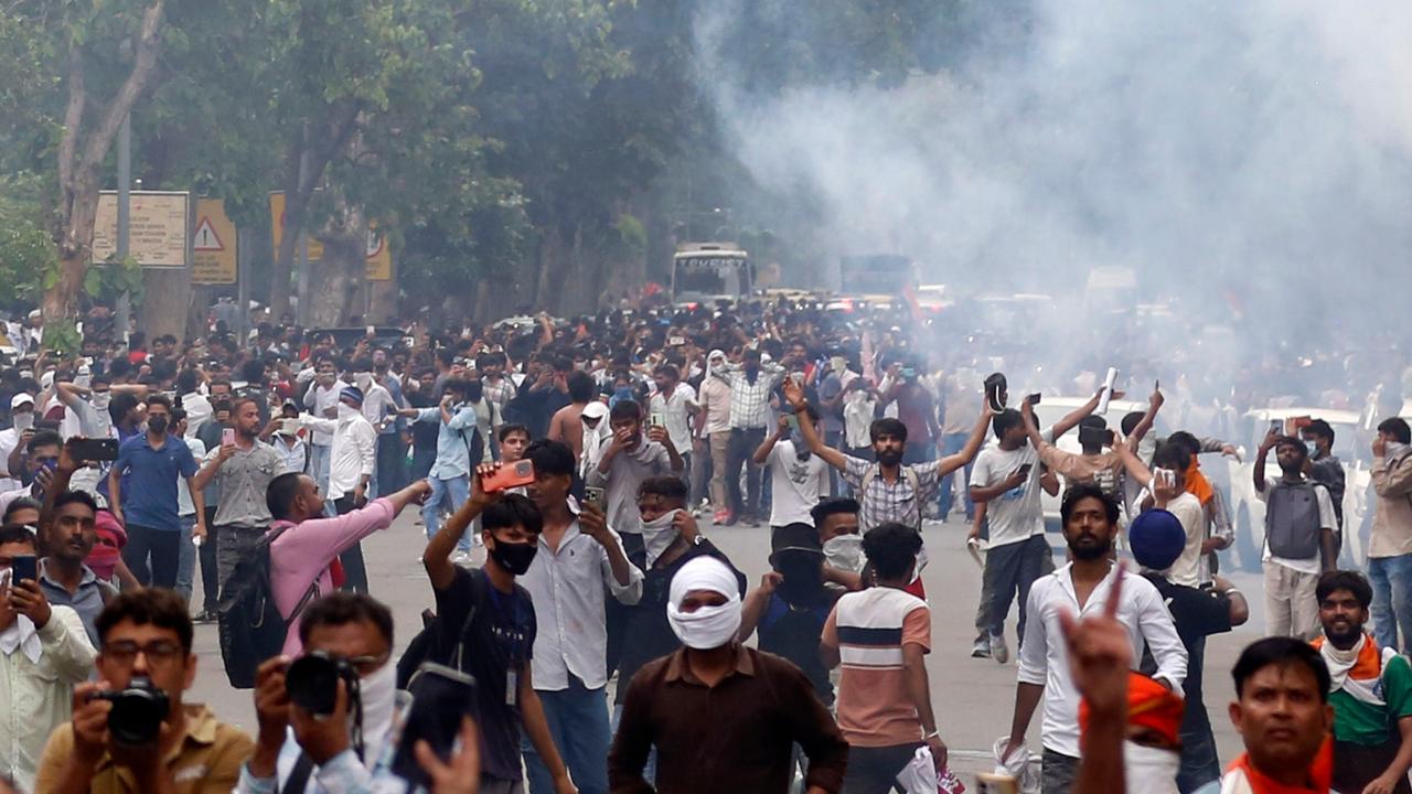 Supporters of the Cockroach Janta Party try to march to parliament