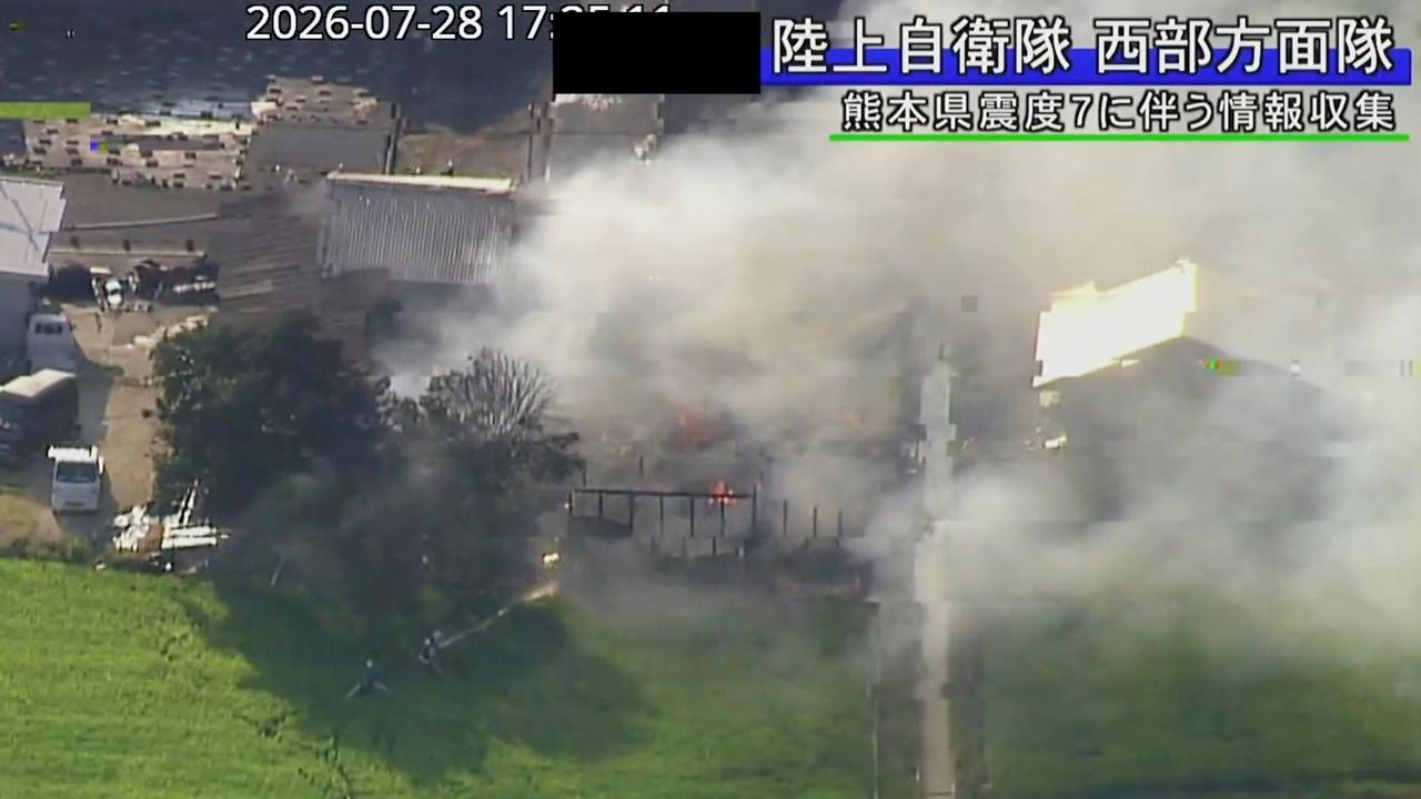 A building on fire following an earthquake in Uki City, Kumamoto