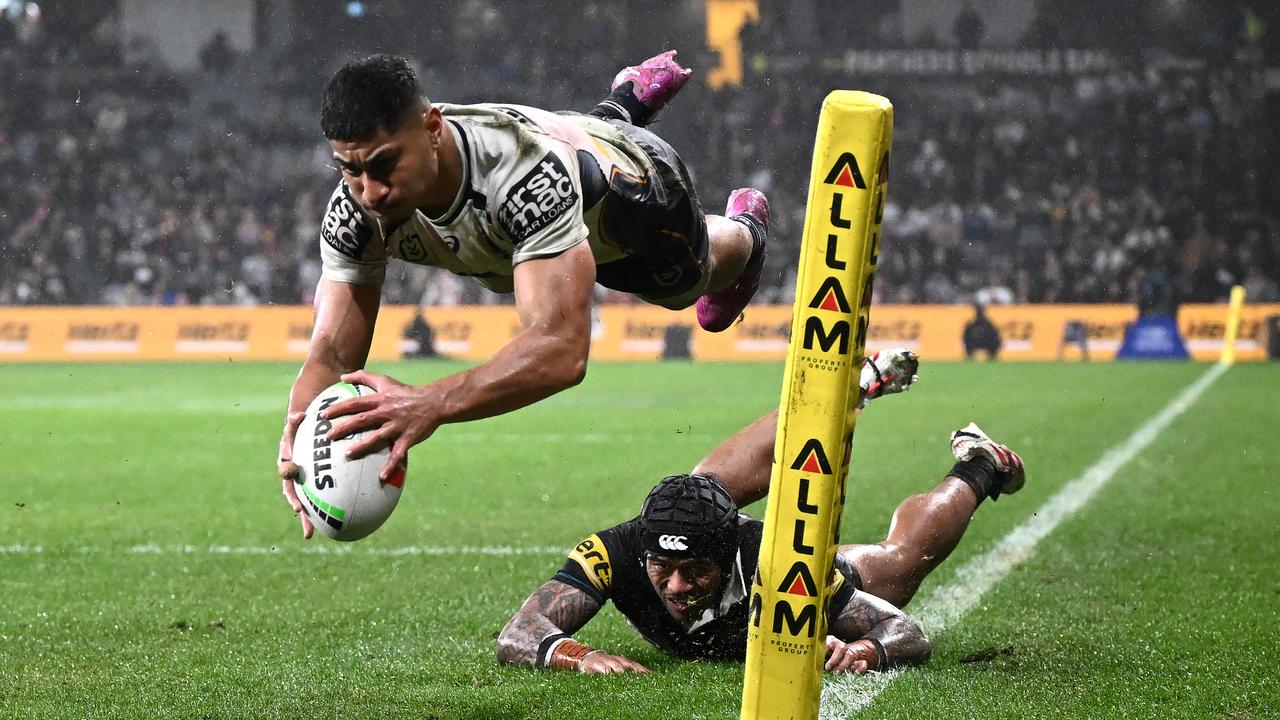 Karapani diving to score a try