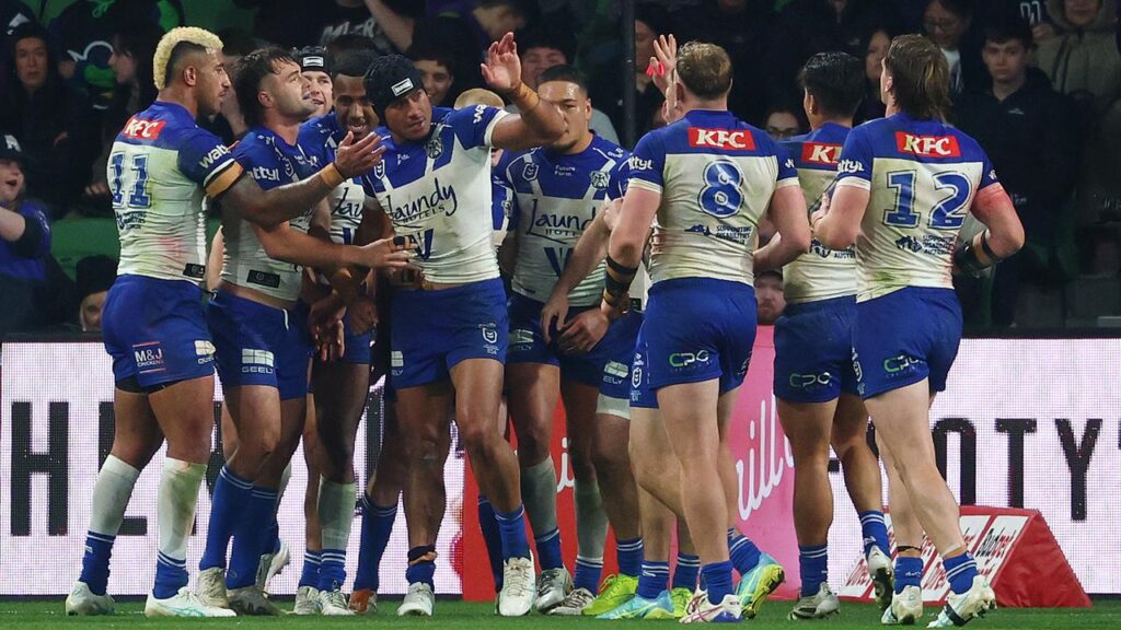 Bulldogs captain Stephen Crichton (c) scored two late tries to seal victory over Melbourne. 

