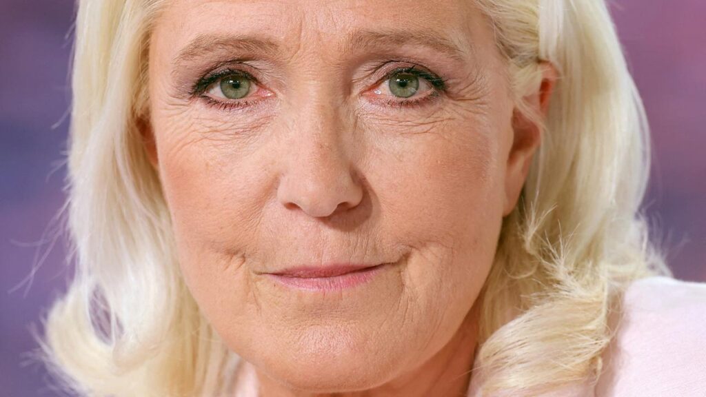 French far-right leader Marine Le Pen says she will run for president after her ban was shortened.
