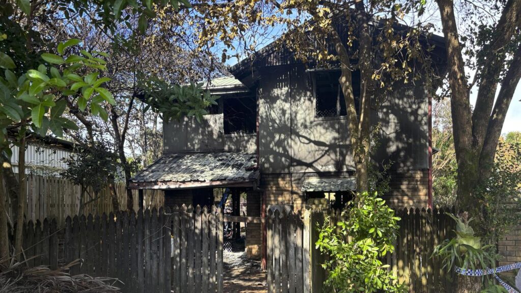 Two women escaped from a building fire, but one later died in hospital from her injuries.
