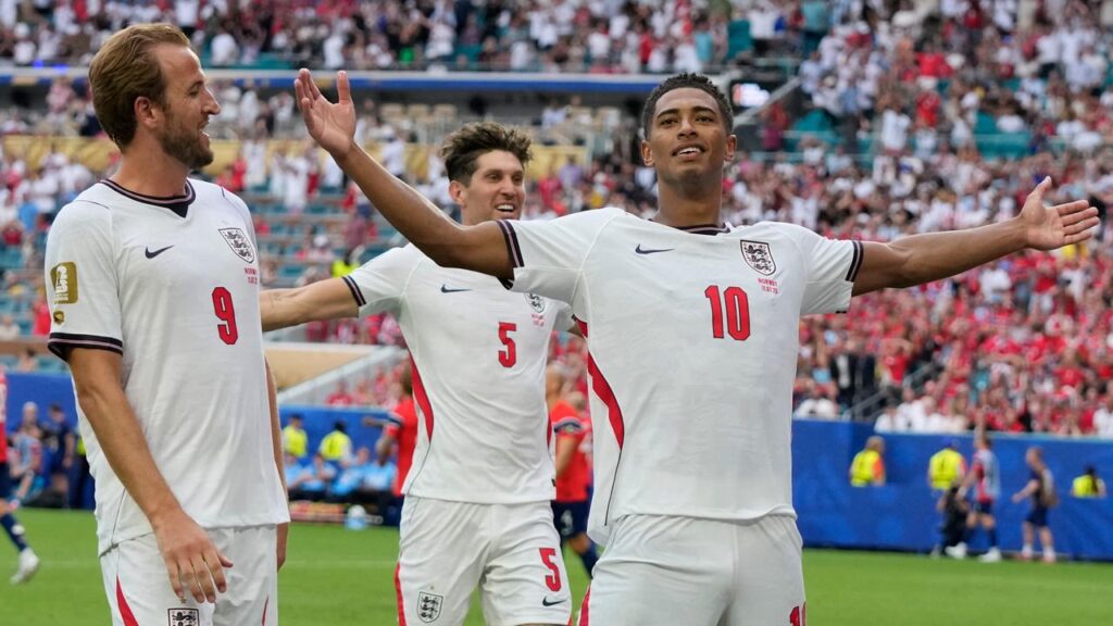 Jude Bellingham (r) is the toast of England after their World Cup quarter-final win over Norway. 
