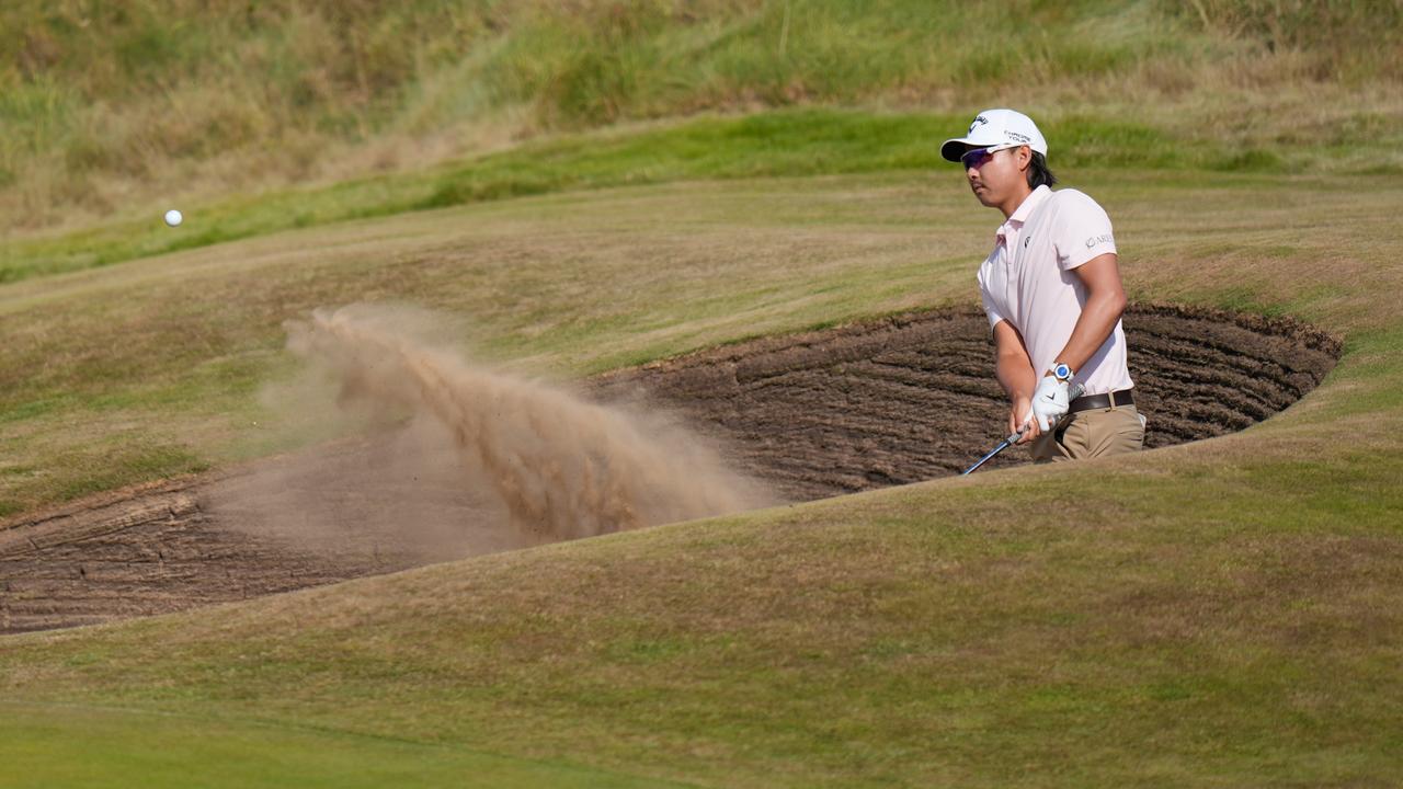 Australia's Min Woo Lee blasts out of a bunker