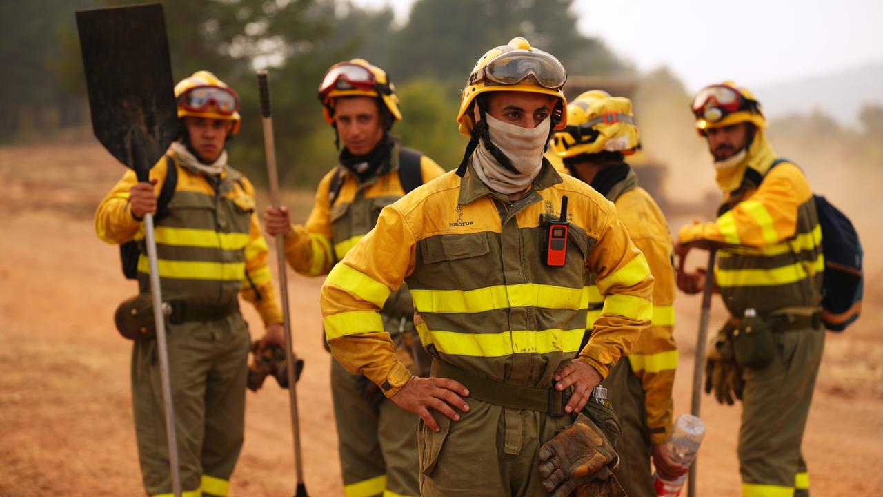 Forest rangers before working on a fire in Guadalajara province, Spain