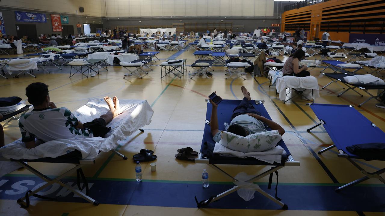 Evacuees rest in shelter due to wildfires