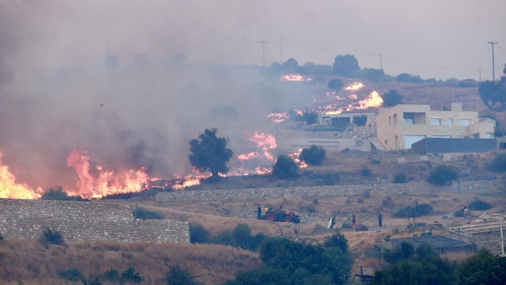 Three Greek firefighters have died as wildfires ravage southern Europe.

