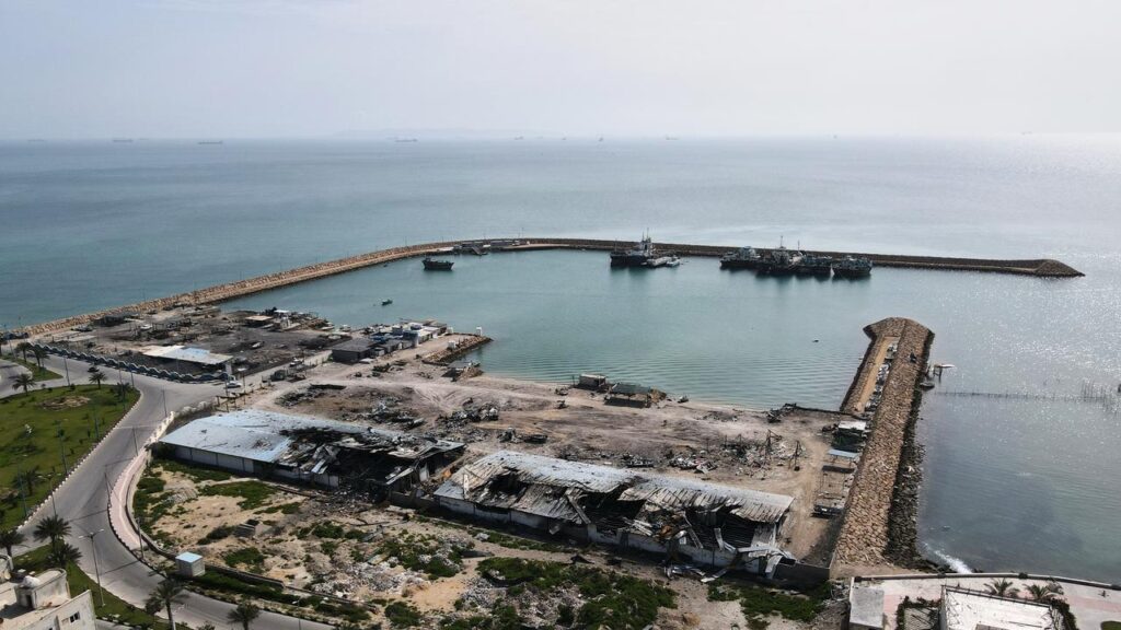 Iranian local officials say US projectiles have been fired at military targets on Qeshm island.
