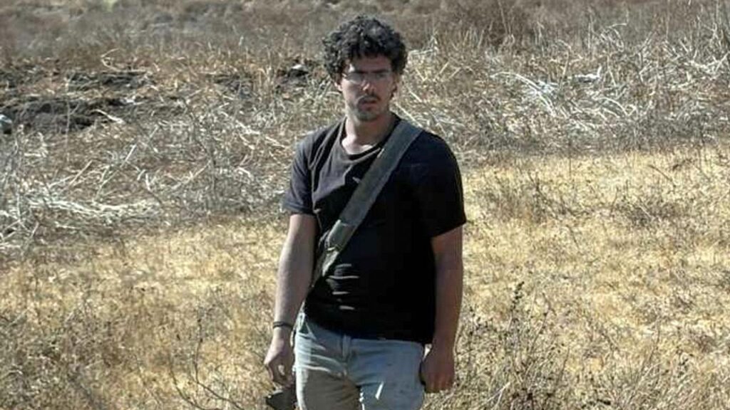 A US congressman says he was harassed by armed Israeli settlers in the occupied West Bank.
