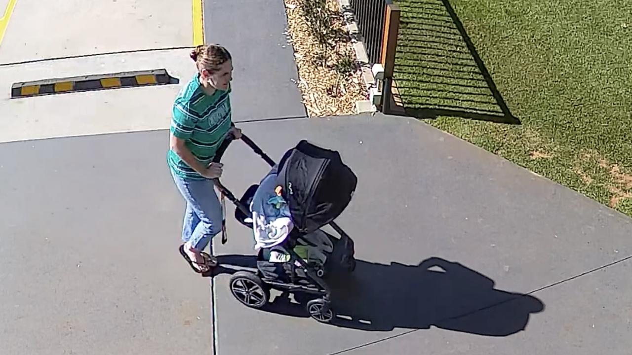 Jane Armstrong pushing a pram