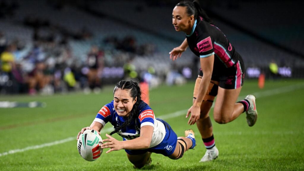 Simina Lokotui of the Bulldogs scores her third try of the NRLW match against the Sharks.
