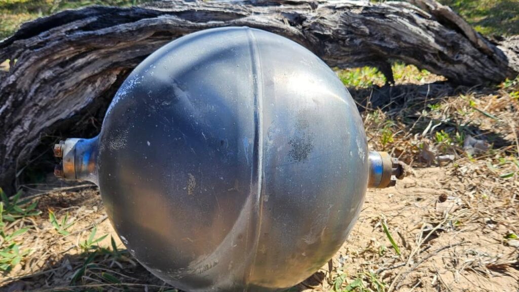 A metal object believed to be space junk has turned up on an Australian beach.
