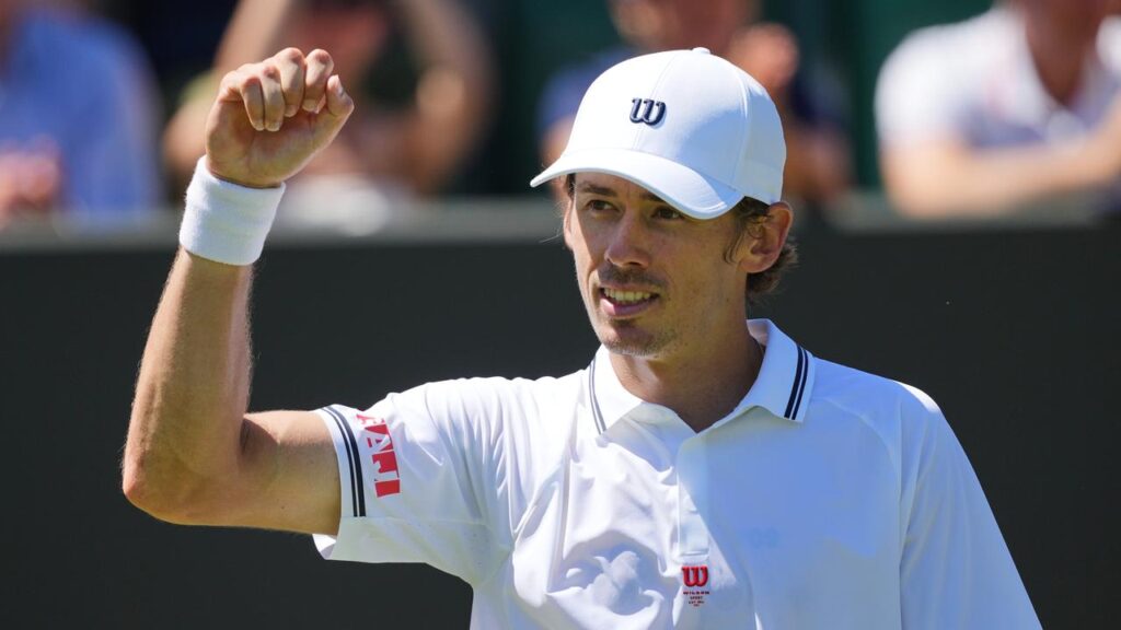 Alex de Minaur savours his second-round success in the southwest London sunshine.
