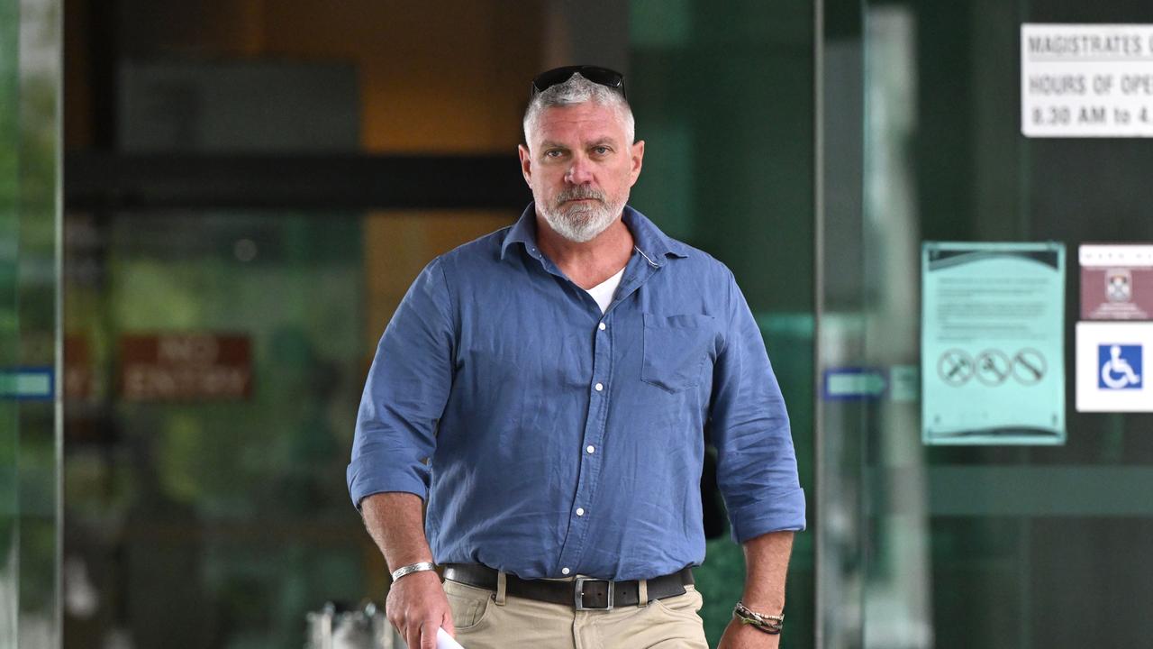 Brett Anderson walks from courthouse