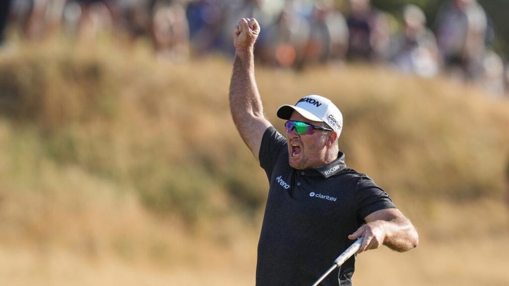 New Zealand’s Ryan Fox celebrates on the 18th green after winning the British Open.

