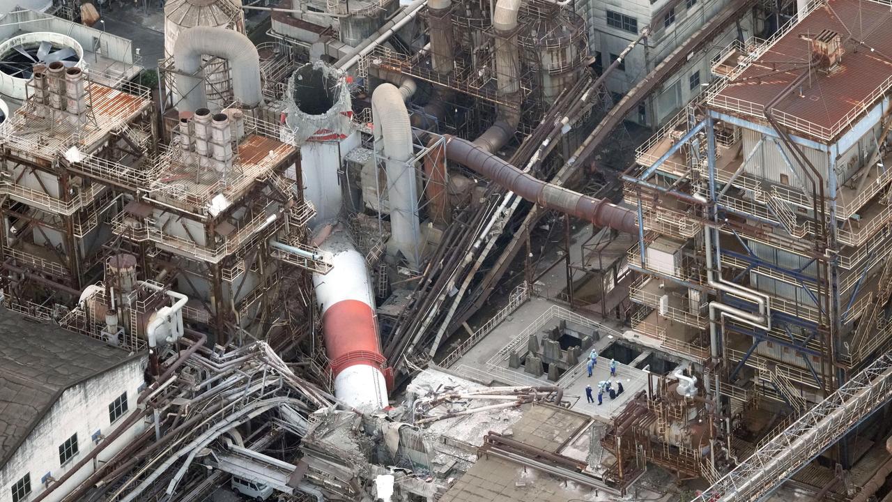 A collapsed smokestack at Nippon Paper Industries' Yatsushiro Mill
