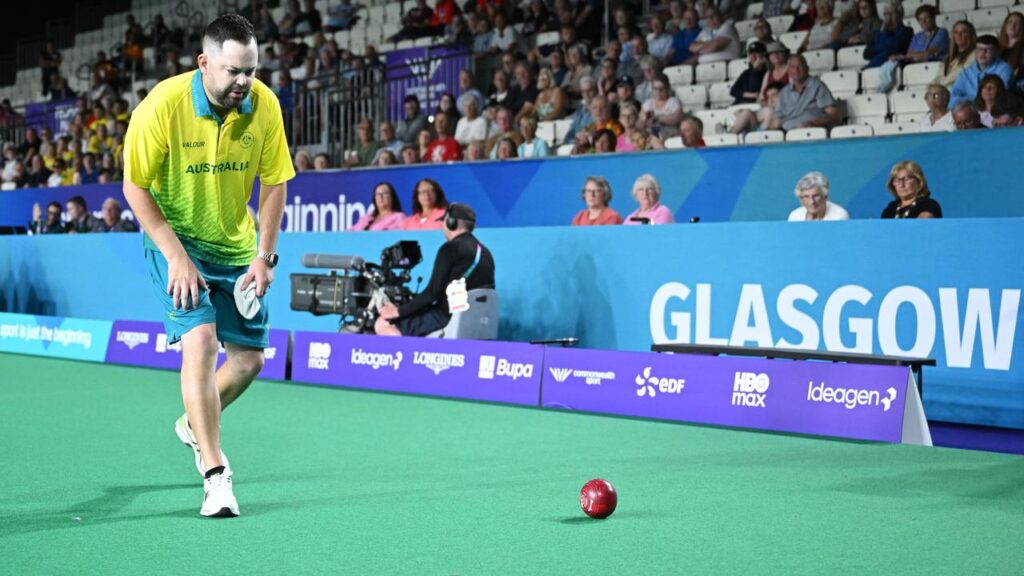 Aaron Wilson has won his opening match of the men’s singles at the Commonwealth Games.
