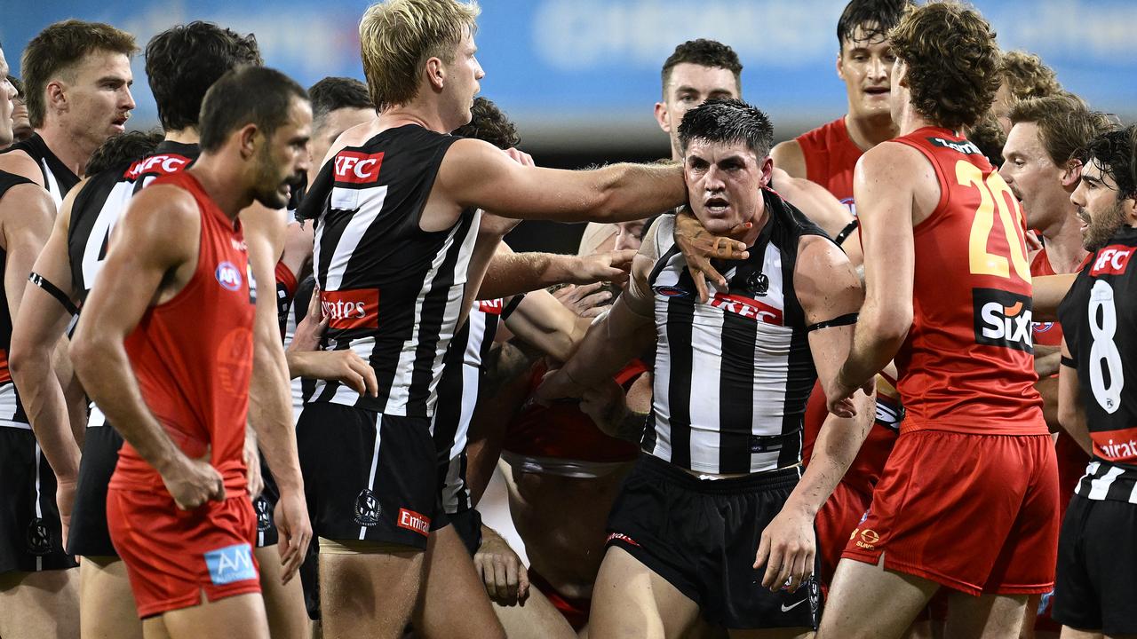 Collingwood's Brayden Maynard glares at Suns player Ben Long