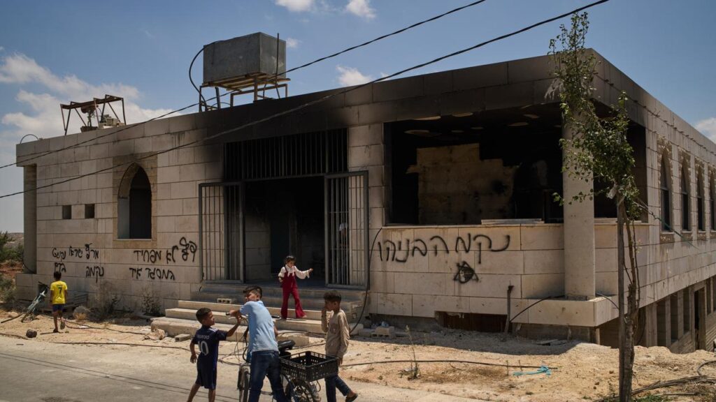 The head of a village council in Qusra says Israeli settlers torched a newly completed mosque.
