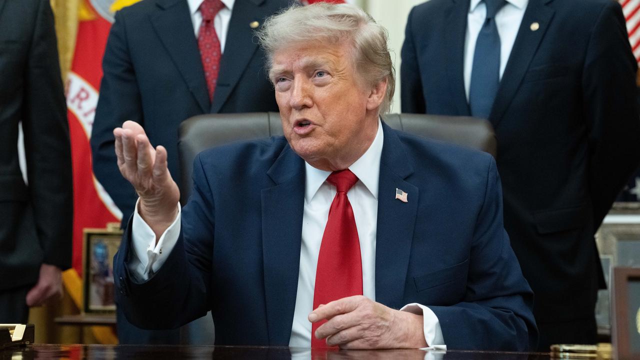 US President Trump speaks to reporters in the Oval Office