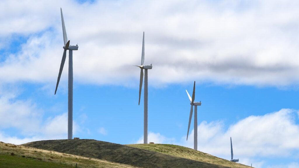 Renewable energy is pushing wholesale prices down, but it may not be all blue skies for power bills.

