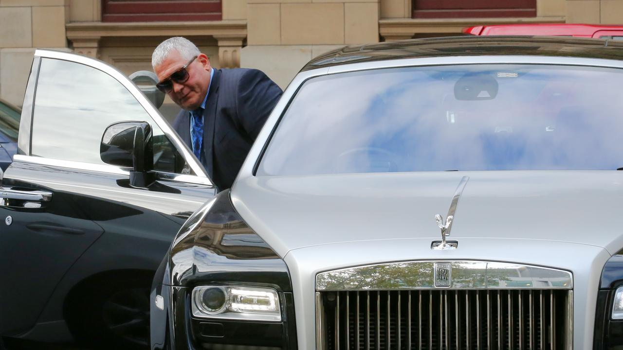 Gatto getting into Rolls Royce