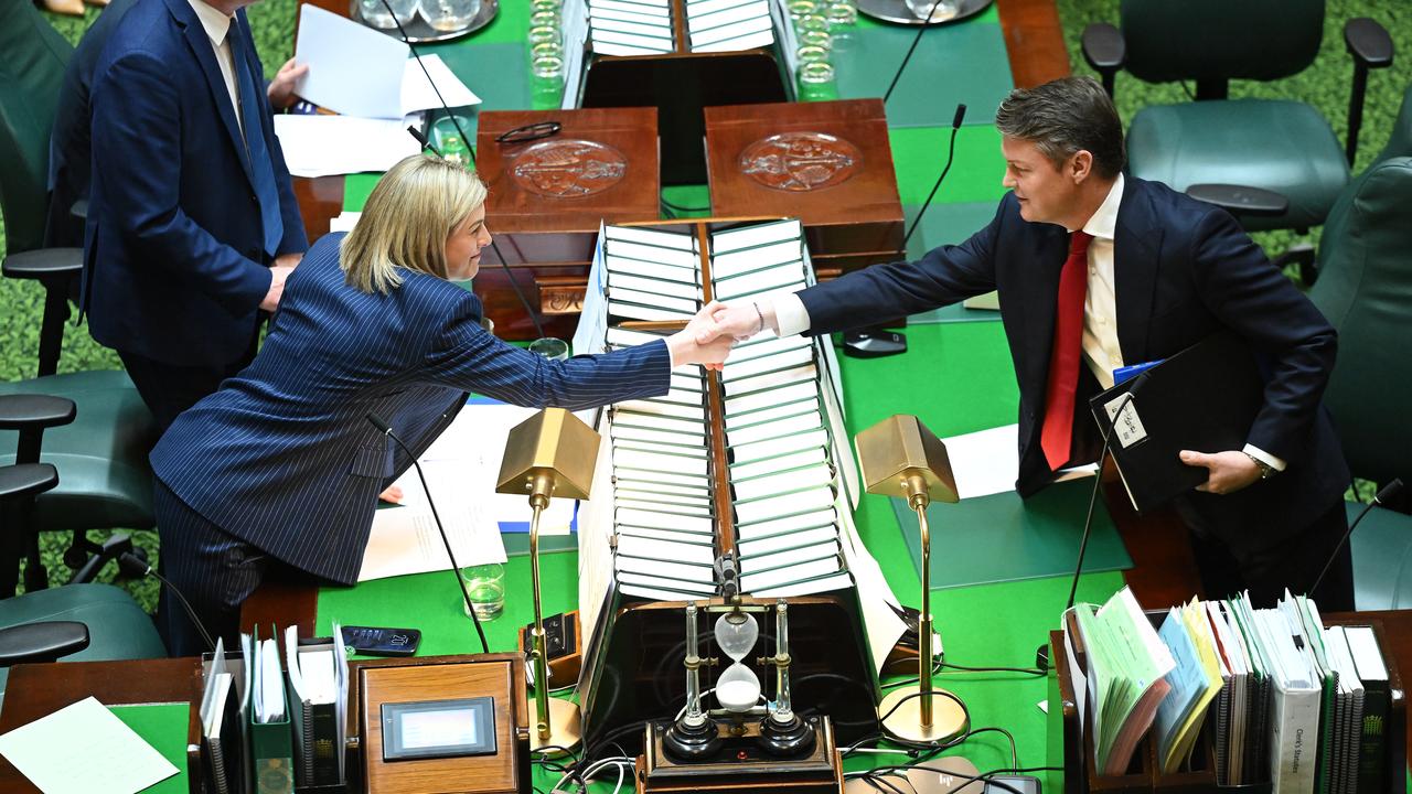 Premier Ben Carroll shakes hands with Opposition Leader Jess Wilson