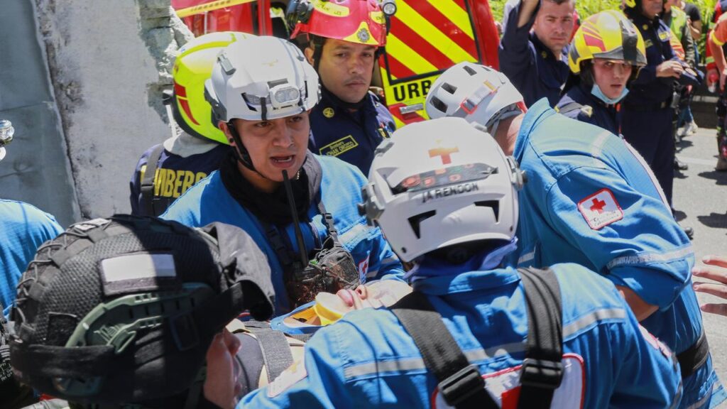 Rescue workers are scrambling to pull survivors out of the rubble after the quake struck Colombia.

