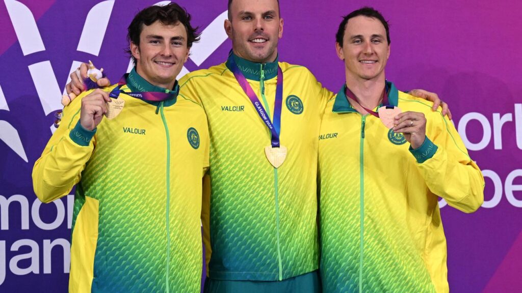 Ben Armbruster (L), Kyle Chalmers (centre) and Cam McEvoy after the 50m butterfly final.
