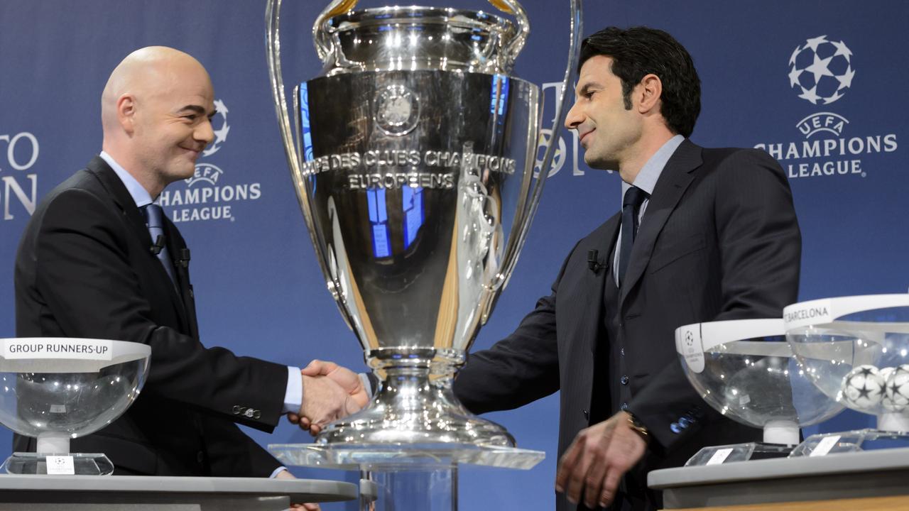 (L-R) Gianni Infantino and Luis Figo.