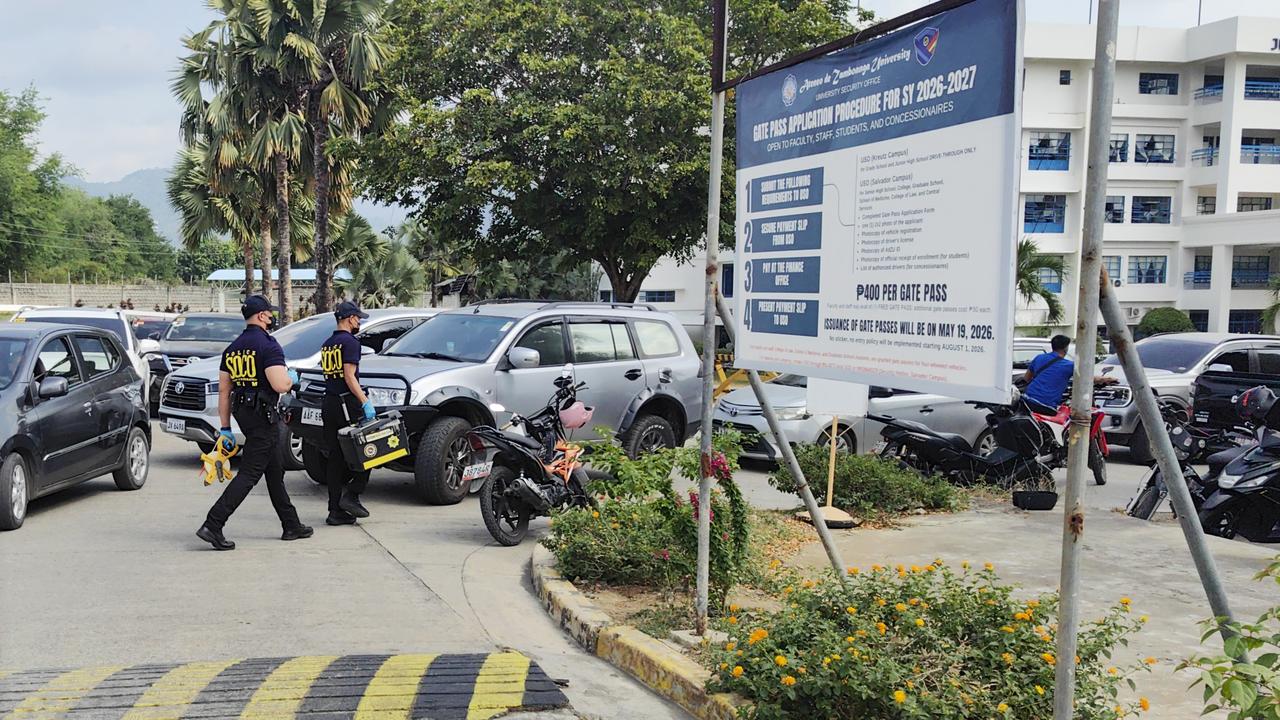 Police after a shooting at a school in Zamboanga City, Philippines