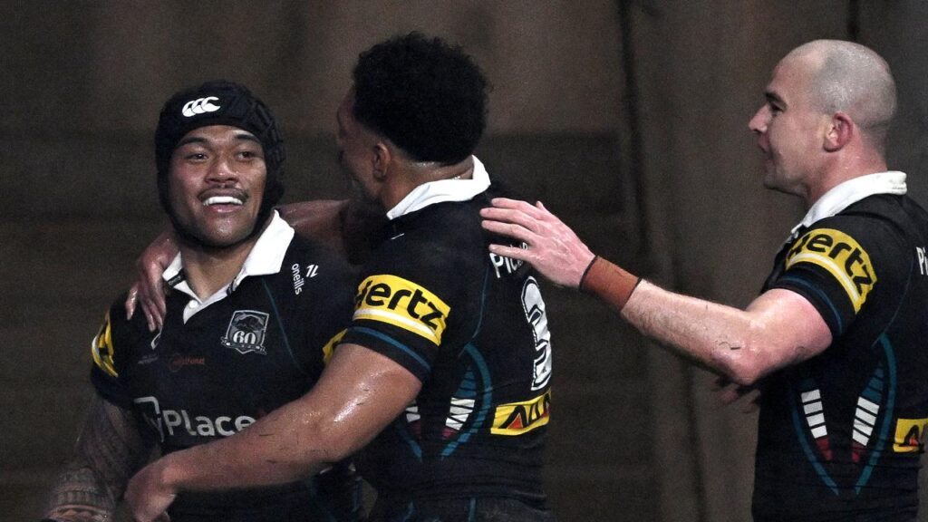 Brian To’o (left) has been a key member of the premiership-winning Panthers, winning four titles.
