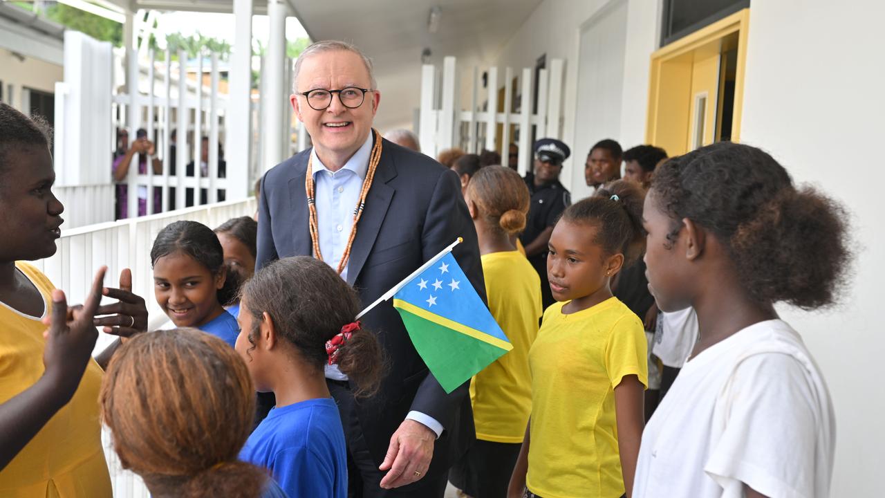 Anthony Albanese with children in Honiara